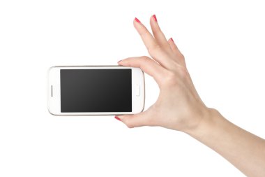 El kız telefon. Beyaz arka plan üzerinde izole beyaz perde smartphone.