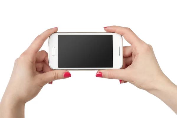 Phone in hand girl. White screen smartphone isolated on white background. — Stock Photo, Image