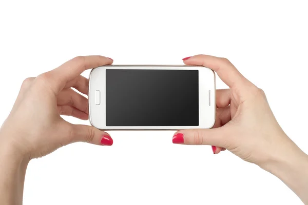 Phone in hand girl. White screen smartphone isolated on white background. — Stock Photo, Image