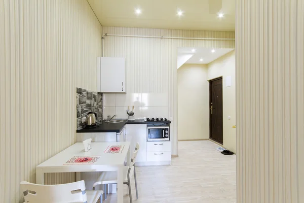 Small kitchen in a studio apartment — Stock Photo, Image