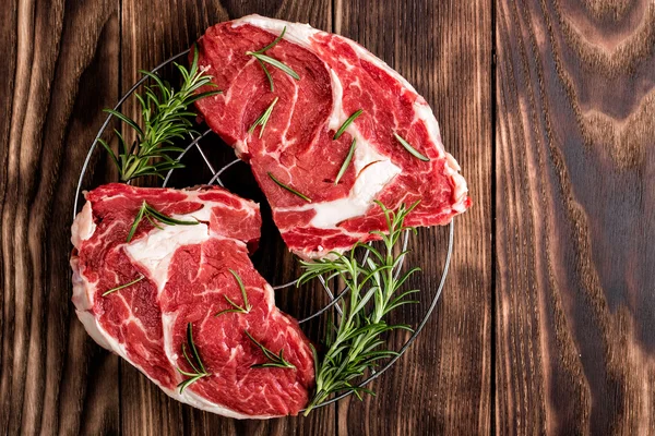 Raw beef steaks — Stock Photo, Image