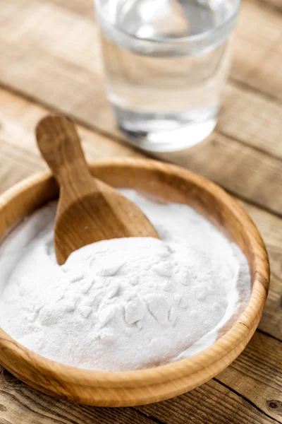 Baking soda on wooden background — Stock Photo, Image