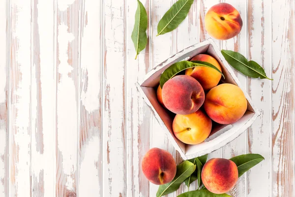 Fresh peaches on white background — Stock Photo, Image
