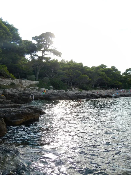 Boat and exotic islands on the Adriatic coast — Stock Photo, Image