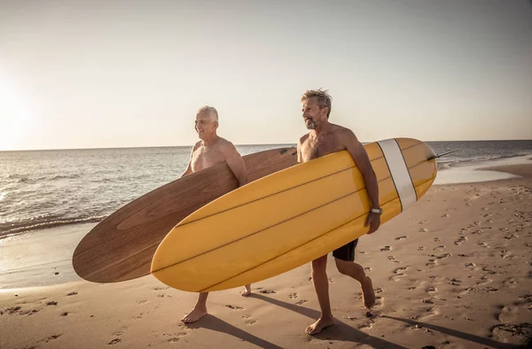 Two Mature Men Walking Surfboards Beautiful Beach Enjoying Paradise Retirement — Stock Photo, Image