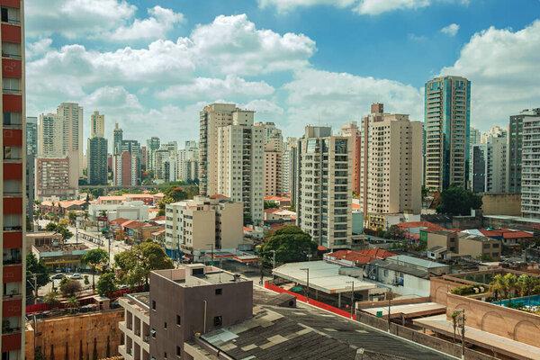 View of the city skyline with streets and buildings in Sao Paulo. The gigantic city, famous for its cultural and business vocation in Brazil.