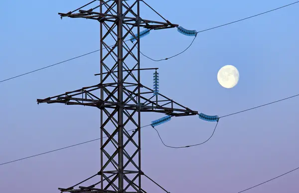 Electric wires against the moon — Stock Photo, Image