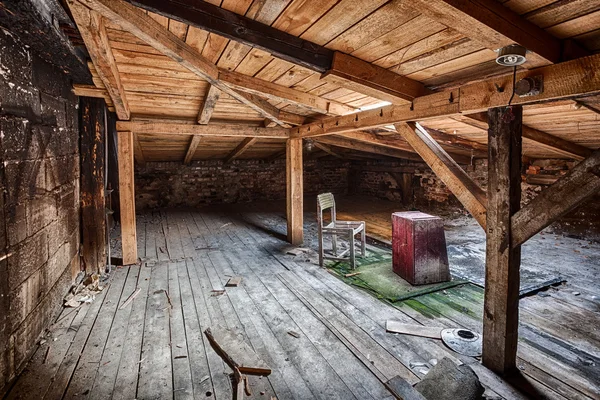 Attic in the destroyed building — Stock Photo, Image