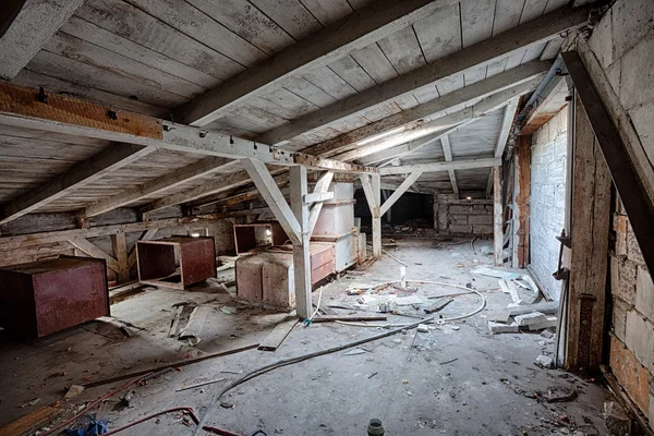 Attic in the destroyed building — Stock Photo, Image