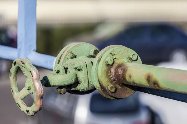 Old green valve on the pipe — Stock Photo, Image