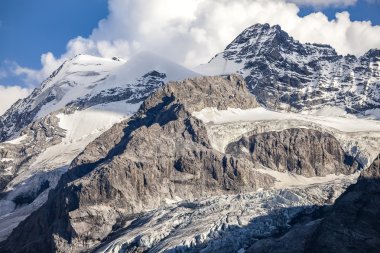Alpine landscape - mountain peak and glacier