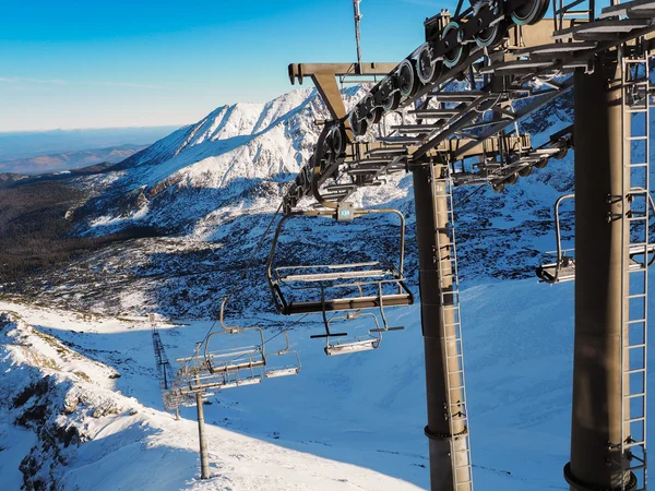 Chairlift in the high mountains — Stock Photo, Image