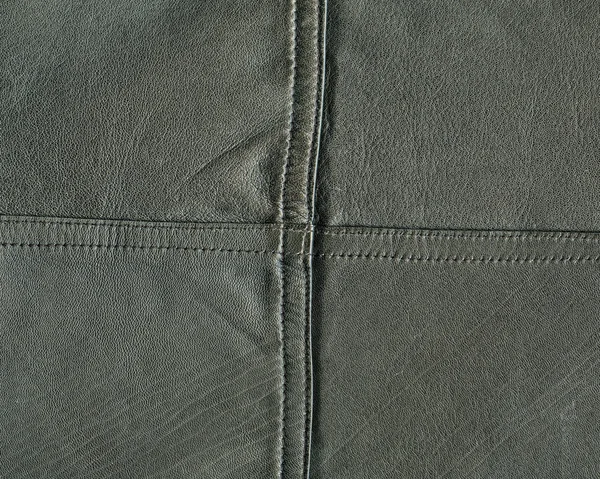 Achtergrond van grijs-groene leder texture — Stockfoto