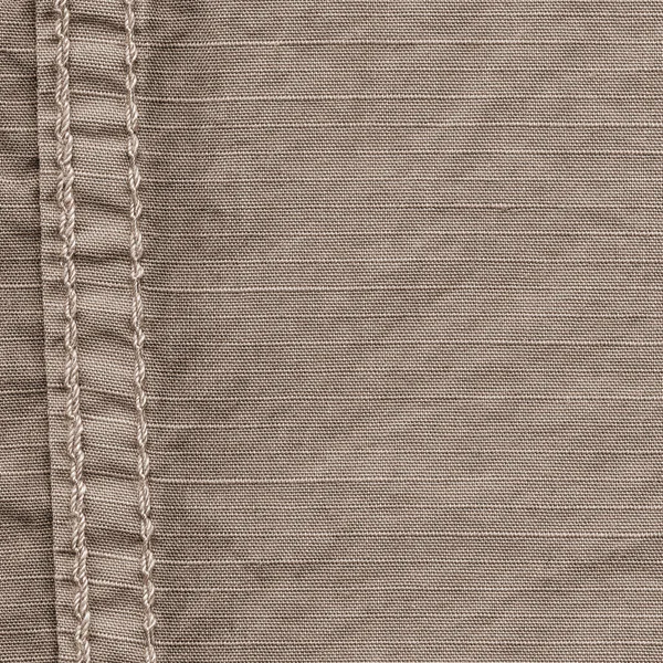 Texture in tessuto marrone, cuciture. Utile come sfondo — Foto Stock