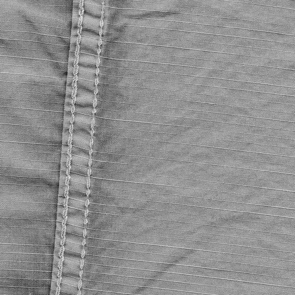 Textura de tela gris, costuras . — Foto de Stock