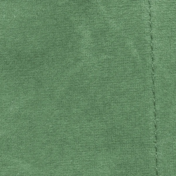 緑の背景と繊維の質感、縫い目 — ストック写真