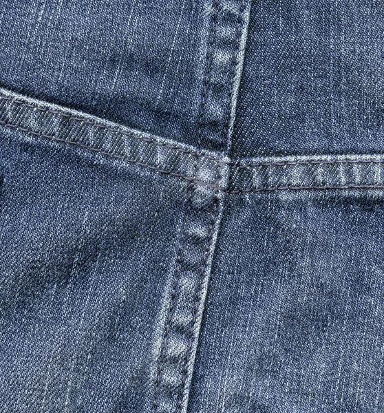 Fragment of trousers as blue denim background — Stock Photo, Image