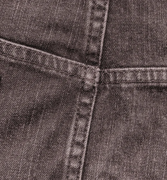 Fragment of trousers as brown denim background — Stock Photo, Image