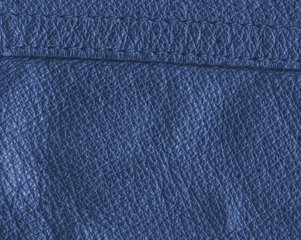 Blauw lederen textuur close-up, naad — Stockfoto