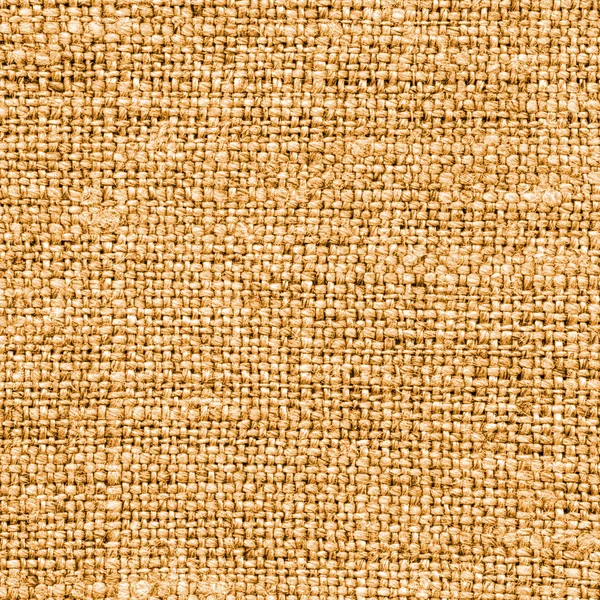Желтая ткань мешковины крупным планом — стоковое фото