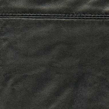 siyah deri doku dikiş ile dekore edilmiştir.