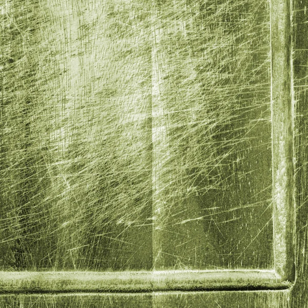 Painted green fragment of old wooden cutting board — Stock Photo, Image