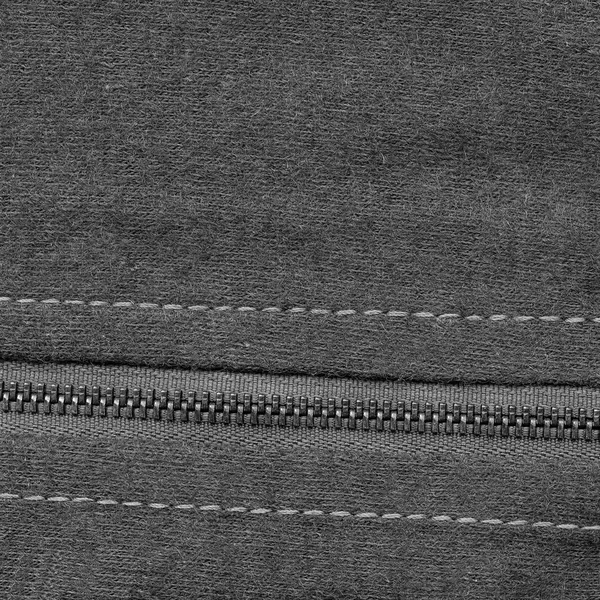 Textura de tecido cinza, zíper, pontos — Fotografia de Stock