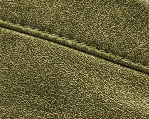 Green leather texture,seam — Stock Photo, Image