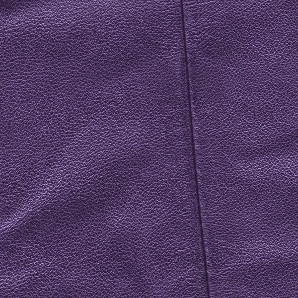 Fundo de couro violeta decorado com uma costura — Fotografia de Stock