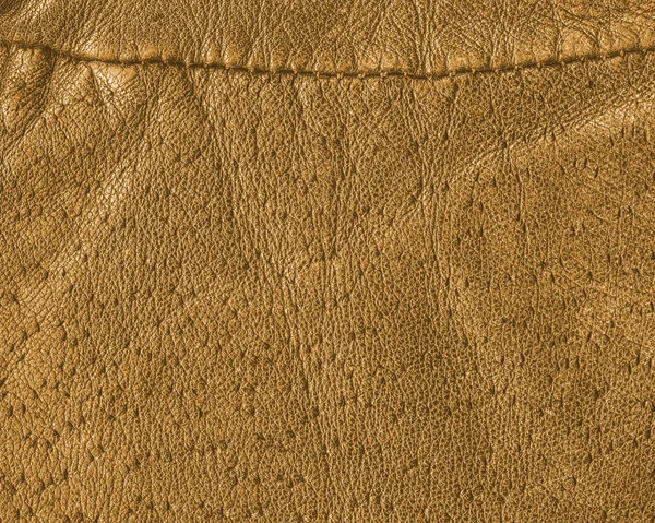 Yellow-brown glove leather texture, seam — Stock Photo, Image