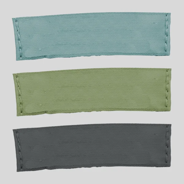 Farklı renk izole üç Kumaş Etiketler — Stok fotoğraf