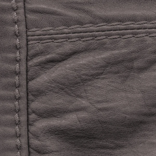 Dark brown leather texture, seams,stitches — Stock Photo, Image