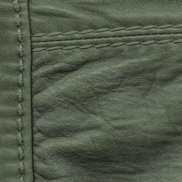 Dark green leather texture, seams,stitches — Stock Photo, Image