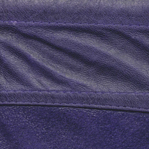 Verfrommeld violet leder texture of achtergrond — Stockfoto