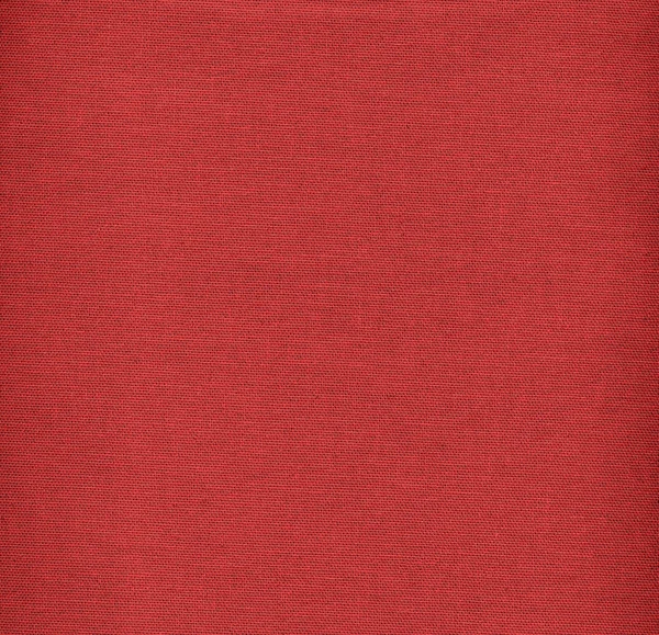Röd syntetiskt tyg textur. — Stockfoto
