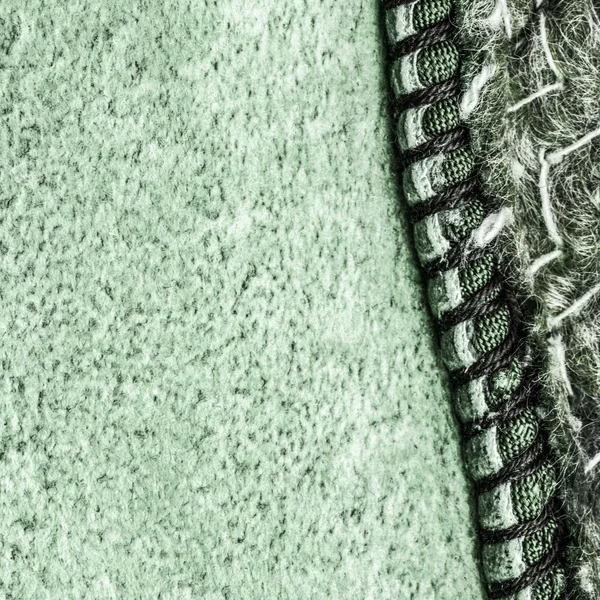 Painted green fragment of  wrong side of sheepskin coat — Stock Photo, Image