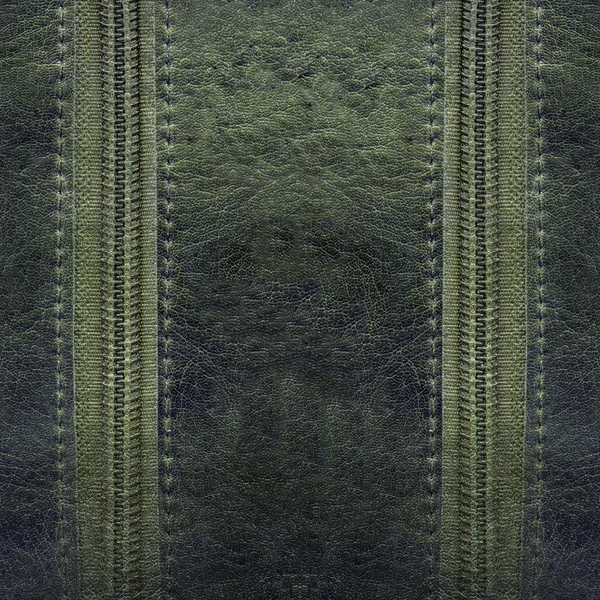 Viejo fondo de cuero verde decorado con dos cremalleras — Foto de Stock