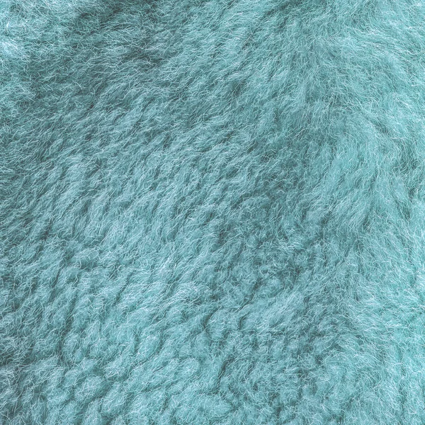 Окрашенные зелено-голубой натуральной текстурой меха или фона — стоковое фото