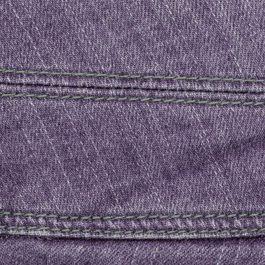 Menekşe jean arka plan dikişleri ile dekore edilmiştir. 