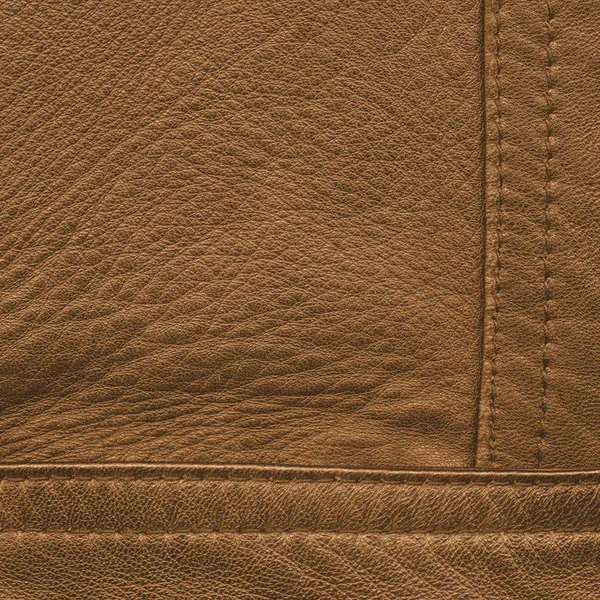 Fondo de cuero marrón decorado con costuras — Foto de Stock