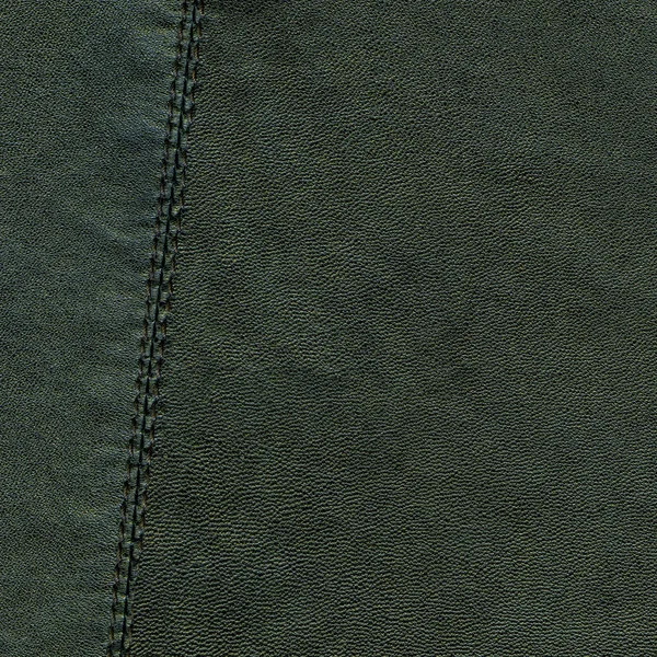 Green leather texture, seam. Useful for background — Stock Photo, Image