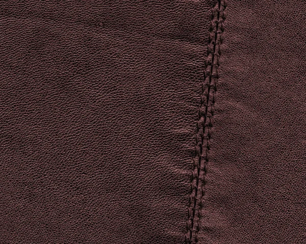Brown leather texture, seam. Useful as background — Stock Photo, Image