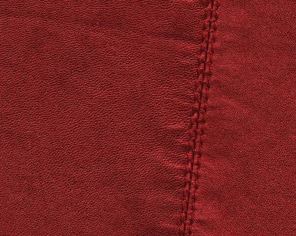 Textura de couro vermelho, costura. Útil como fundo — Fotografia de Stock