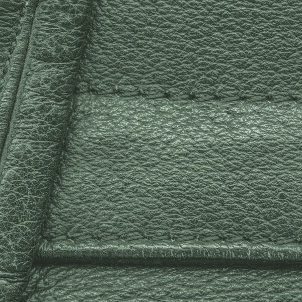 Green leather texture or background,seams — Stock Photo, Image