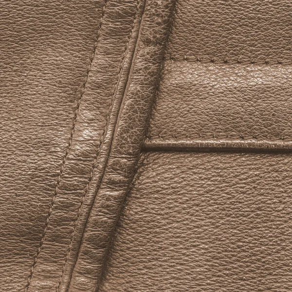 Fragment der Jacke als hellbrauner Lederhintergrund — Stockfoto