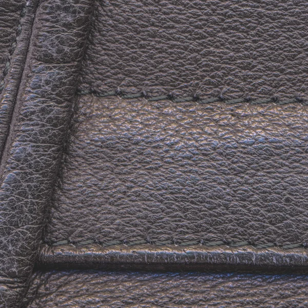 Gammal och sliten brun läder texture, sömmar — Stockfoto