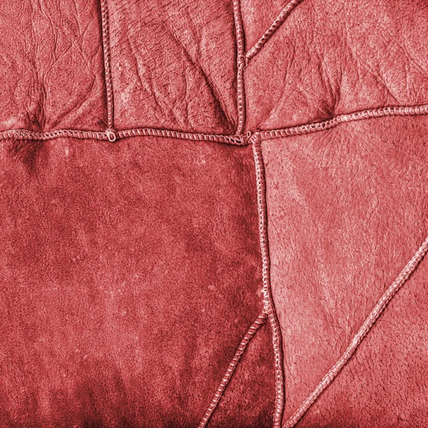 A textura do lado errado de um casaco de peles pintado de vermelho . — Fotografia de Stock