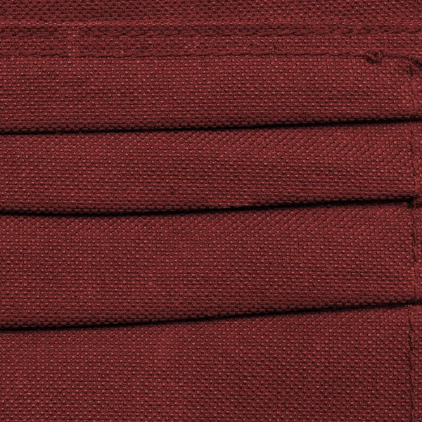 Fundal textil sintetic roșu închis — Fotografie, imagine de stoc