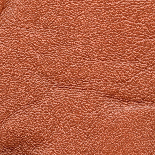 Oranje leder texture, handig als achtergrond — Stockfoto
