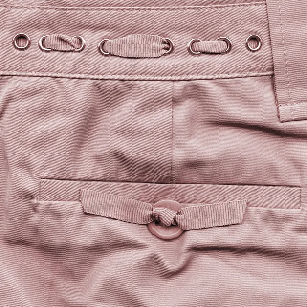 Fragment of pink female summer trousers — Stock Photo, Image